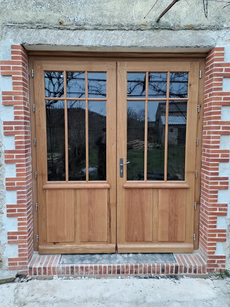 Porte d'entrée deux vantaux en bois