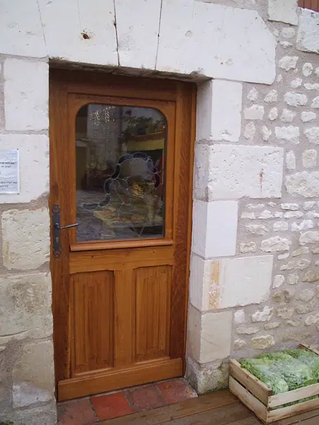 Porte d'entrée en bois vitrée